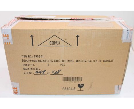 A Corgi Aviation Archive trade box containing six various Predators of the Skies series diecast aircraft, three various examp