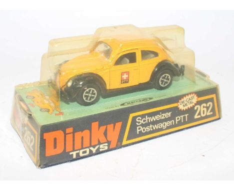 A Dinky Toys No. 262 Schweizer Postwagen PTT saloon finished in yellow and black with PTT transfers to sides, in the original