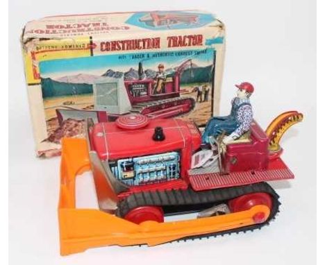 TN Toys (Japan) tinplate "Construction Tractor" - impressive battery-operated model is red, with detailed tin printing, red t