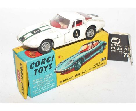 A Corgi Toys No. 324 Marcos 1800 GT comprising of red body with red interior and racing No. 4 with wire work hubs, housed in 