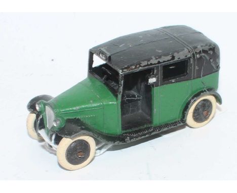 Dinky Toys, No.36g Pre-war Taxi, green body, black chassis, open rear window, smooth black cast hubs, white tyres - rear axle