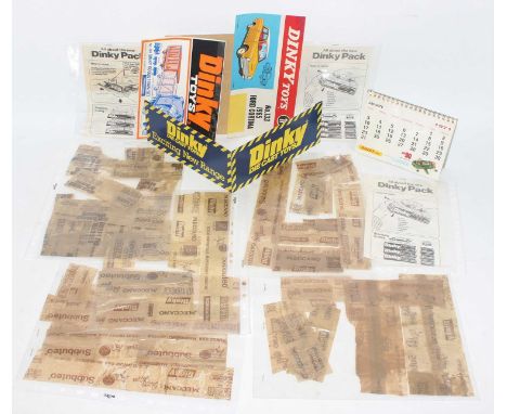 A quantity of various Dinky Toy advertising signs and literature to include a Dinky Toys 1971 desktop calendar, a 1970s Dinky