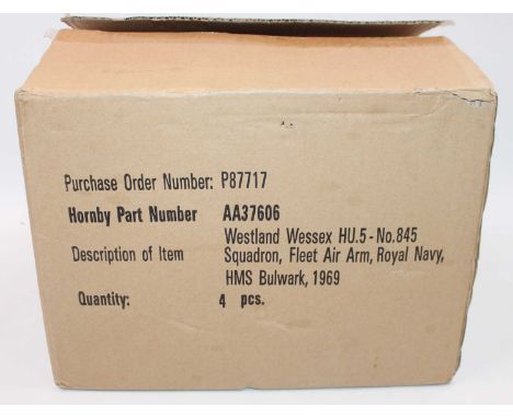 A Corgi Aviation Archive trade box of four model No.AA37606 Western Wessex HU.5 HMS Bulwark 1969 helicopters, housed in the o