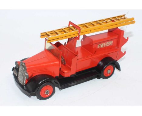 A Tekno No. 351 tinplate Falck fire engine comprising of orange to red body with black chassis and running boards, and a yell