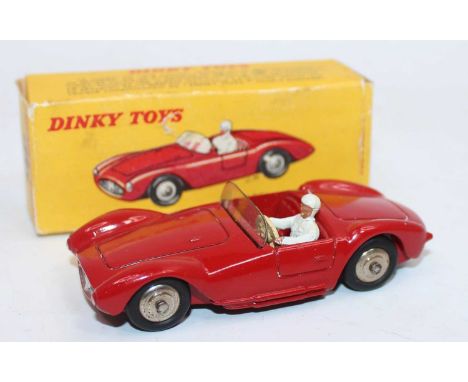 French Dinky Toys No. 22A Maserati Sport 2000 race car comprising of red body with spun hubs and white driver figure, with or