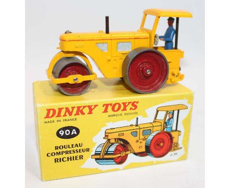 French Dinky Toys No.90A Richier Diesel Compressor road roller with yellow body with red hubs and driver figure, complete wit