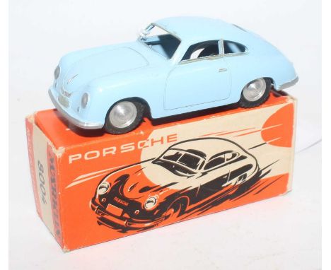 A Marklin No.8004 Porsche 356 saloon in light blue body with silver hubs and silver detailing, in original orange, white and 