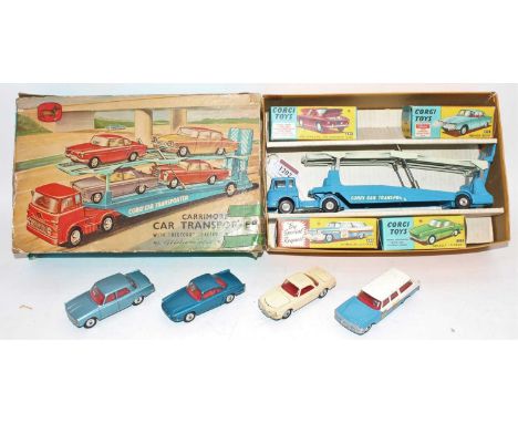 A Corgi Toys gift set 26 Carrimore Car Transporter with four boxed cars comprising of blue car transporter with hubs together