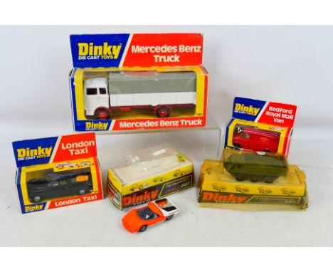 Dinky Toys - A collection of five boxed Dinky Toys. Lot consists of Dinky Toys #940 Mercedes Benz Truck; #284 London Taxi; #2