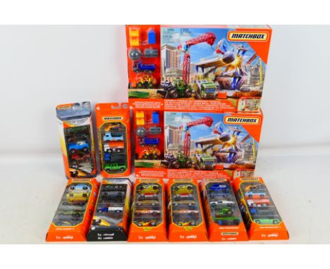 Matchbox - Mattel - Two boxed Matchbox 'Downtown Demolition Play Sets with eight Matchbox 5-packs. Models appear to be in Min