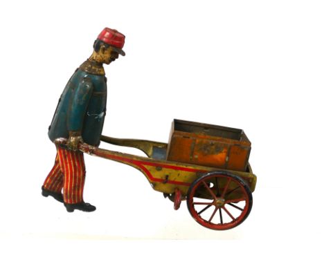 Lehmann - An unboxed vintage tinplate clock work Jim the Walking Trollyman. Item appears age worn with trunk lid missing. Int