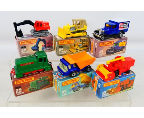 Matchbox Superfast - Six boxed Matchbox Superfast diecast model vehicles. Lot includes #64 Caterpillar Bulldozer; #23 Atlas T