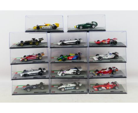 14 off 1:43 scale diecast model F1 racing cars, all different, all appear mint in original mint transparent display cases  (t