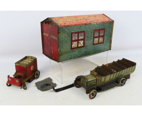 Whitanco - Lehmann - A mixed assortment of vintage tinplate items to include a Motor Garage (30cm x 14cm x 17cm) housing a da