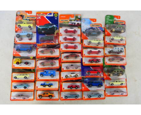 Matchbox - A group of 35 carded and sealed Matchbox diecast vehicles. Lot includes 1970 Ford Capri; Mercedes Benz Station Wag