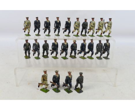 Britains - 24 loose vintage Britains Royal Navy Metal figures. Includes various soldiers in white and blue uniforms. Items sh