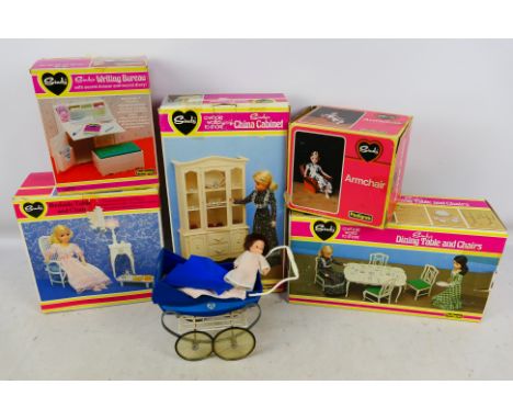 Pedigree - 5 boxed Sindy items. Includes #44583 China Cabinet, #44582 Dining Table and Chairs, #44512 Writing Bureau and othe