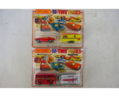Matchbox - Two carded Matchbox Superfast Twin packs. Lot consists of Matchbox TP-4 Holiday set with Matchbox TP-8 Transporter
