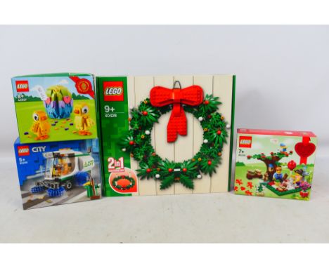 Lego - 4 factory sealed Lego sets. Includes #40426 2 in 1 Christmas Wreath, #40236 Romantic Valentine Picnic, #60249 Street S