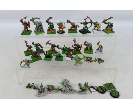 Warhammer - Citadel - Games Workshop - A group of 28 Warhammer Orcs & Goblin metal figures. The figures are painted, and are 