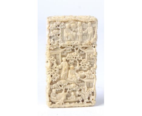 A Chinese Canton carved ivory card case, late 19th Century 
To rectangular section case, carved with depictions of Manchu fig