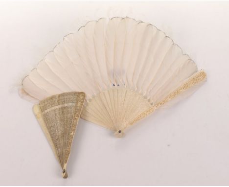 Two Chinese Canton carved ivory fans, late 19th Century 
The first a nineteen blade example, carved with typical Chinese moti