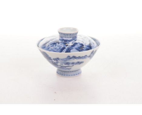 A Chinese blue and white porcelain lidded bowl
The 'U' form bowl rising from a spayed footring, the thinly potted bowl painte