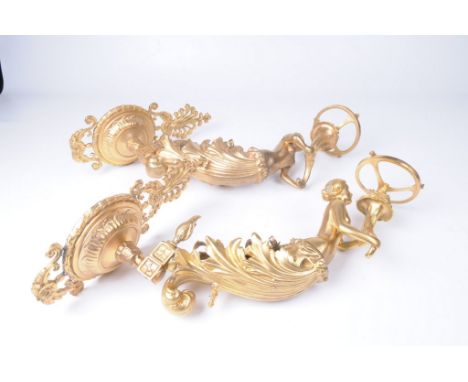 A pair of gilt metal Louis XVI style figural wall appliques in the manner of Ferdinand Barbedienne
The stepped and domed wall