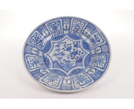 A Chinese Kraak porcelain style dish
The circular form dish with sloped sides and deep central well, the central rosette shap