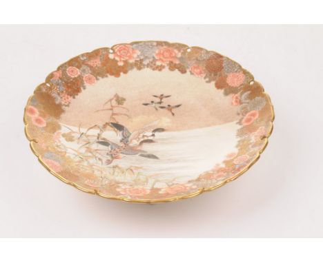 A Japanese satsuma pedestal dish, signed Seikozan Tsukuru, Meiji Period (1868-1912)
The circular lobed rim, before upper well