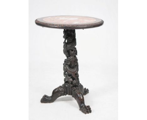 A Chinese carved hardwood marble topped occasional table, late Qing Dynasty (1644-1912)
The variegated rouge marble inset cir