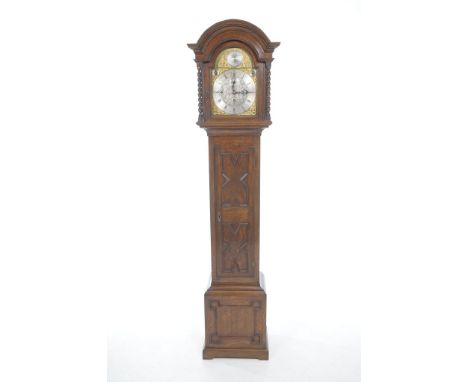 A 1920's eight day oak longcase clock, 24cm silvered dial with Roman numerals, Westminster and Whittington chimes
Subsidudary