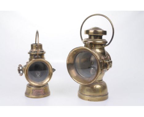 Two early 20th Century brass car lamps 
To include a Lucas 'King of the Road' side lamp, numbered 634, 22cm high, together wi