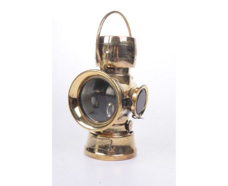 An early 20th Century Joseph Lucas 'King of the Road' rear car lamp 
The polished brass lamp, with side fittings and loop han