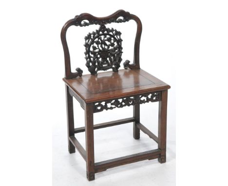 Chinese huanghuali style hall chair, late Qing Dynasty /Republic period 
The indented top rail joined to a curved backsplat c