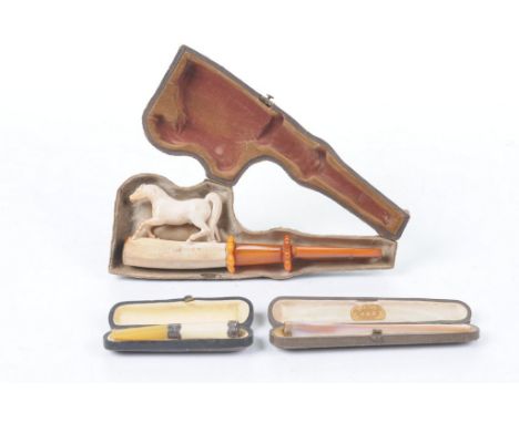 A collection of late 19th/early 20th Century smoking ephemera
To include a carved and painted meerschaum pipe, the bowl forme