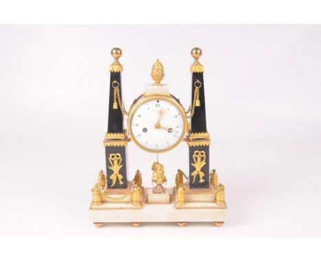 A French Louis XVI Ormolu Mounted Black and White marble mantel clock, by Gavelle , Le Jeune , Paris 
The suspended white ena