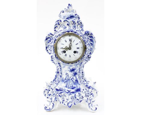 Dutch blue and white pottery balloon shaped two train&nbsp;mantel clock, the S. Marti movement striking on a bell, the moveme