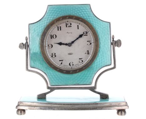 Asprey silver and blue enamel eight day boudoir clock, the 2" silvered dial and shaped surround within chavel supports over a
