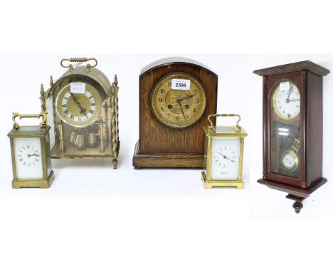 Oak two train mantel clock striking on a gong, 9.25" high; also a contemporary Koma torsion mantel clock, contemporary Highla