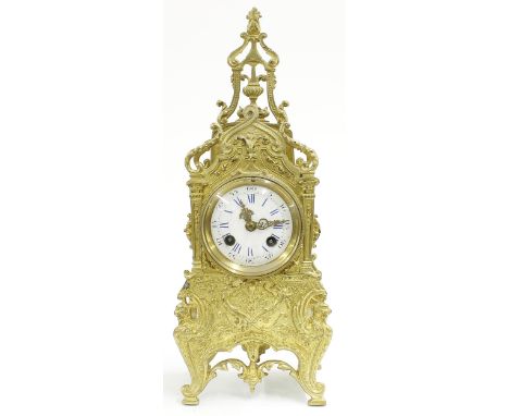 Small French brass two train mantel clock striking&nbsp;on a bell, the 3" white dial within an ornate case, 14.75" high (no p