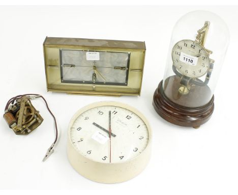 Bulle 800 Days electric mantel clock, under a glass dome and upon a turned mahogany base, 10.75" high; also a Metamec electri