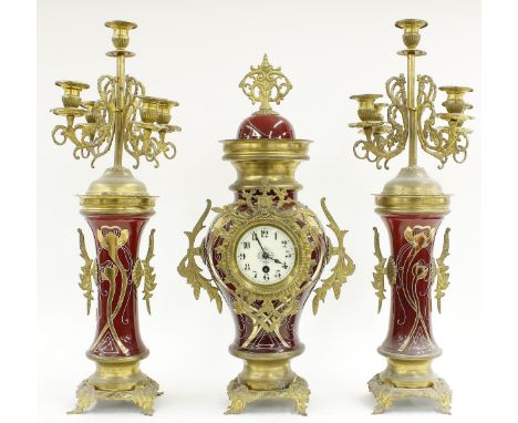 Decorative single train French style mantel clock garniture,&nbsp;the 3.5" white dial inset into a red ceramic vase shaped ca