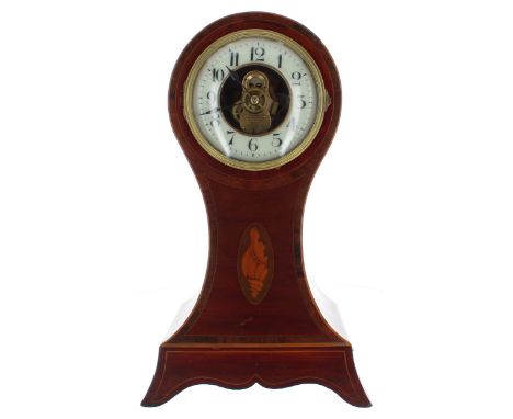 Good mahogany inlaid Eureka balloon electric mantel clock, the 4.75" cream chapter ring enclosing a skeletonised centre signe