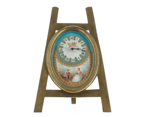 Attractive French porcelain and brass miniature easel clock timepiece, the oval porcelain dial plate with Roman numeral chapt