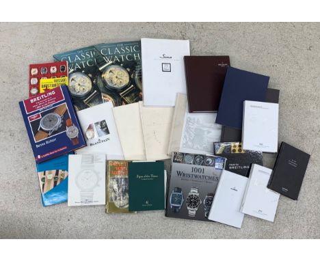 Large quantity of books relating to pocket and wristwatches, including Rolex, Breitling, Zenith, Patek Philippe and others (o