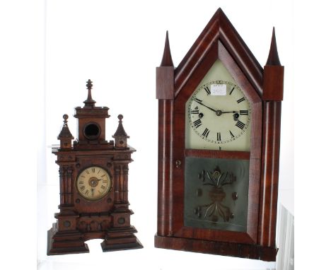 Black Forest cuckoo clock timepiece, the 2.5" dial within a pillared breakfront case surmounted by a crenelated tower from wh