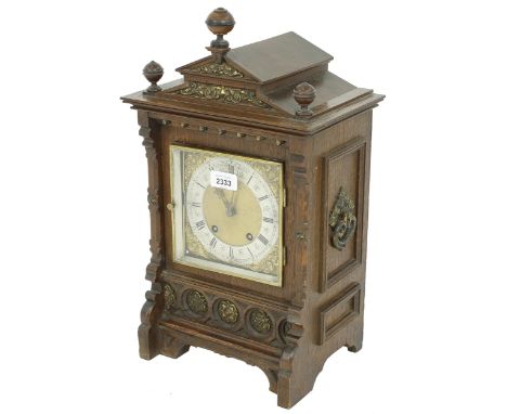 German oak two train ting-tang mantel clock, the Lenzkirch movement no. 52/875827 striking on two gongs, the 5.5" silvered ch