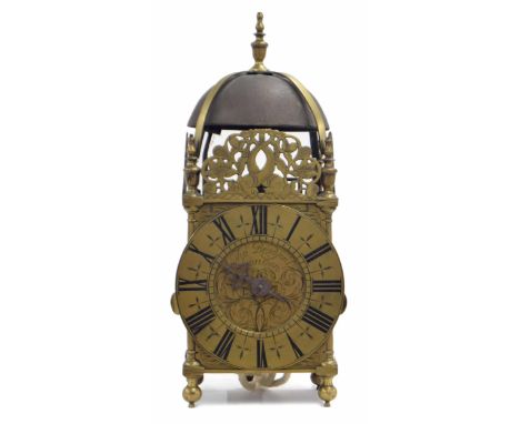 English brass hoop and spike verge lantern clock, the 6.25" chapter ring enclosing a foliate engraved centre signed Tho Bradf