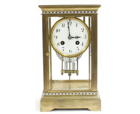 French brass four glass two train mantel clock striking on a gong, the 3.5" white dial within a bevelled glazed stepped case 